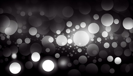 a background with a black and white gradient. Circular bokeh lights in varying sizes and opacities create an ethereal and sophisticated effect, adding depth and interest to the overall compositionの素材