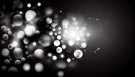 a background with a black and white gradient. Circular bokeh lights in varying sizes and opacities create an ethereal and sophisticated effect, adding depth and interest to the overall compositionの素材