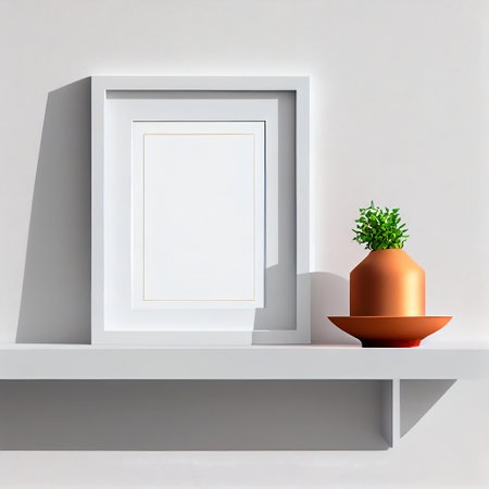 The image is a mock-up of a frame placed on a wooden shelf against a wall. The frame is empty, providing ample copy space for the placement of artwork, pictures, prints, or posters.の素材