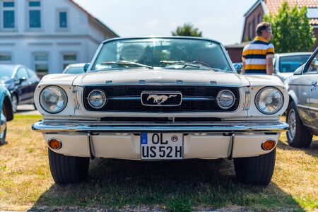 Varel, Germany, July, 28,2019: Vintage cars meet at the Vareler harbor. Various vintage vehicles -...