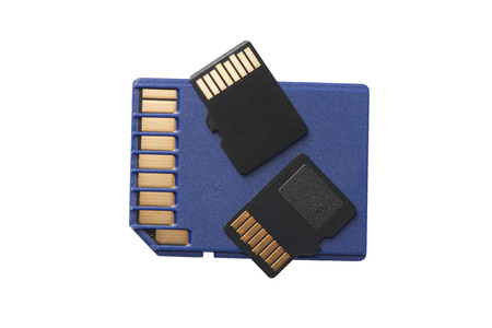 Two Micro SD Cards sitting on a regular size SD card