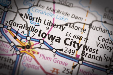 Closeup of Iowa City, Iowa on a road map of the United States.の写真素材