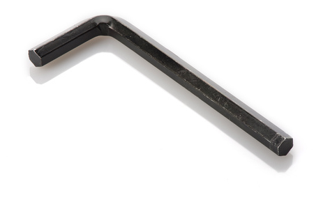 A single allen wrench or hex key on white with reflection.