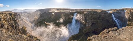 Panoramic view of Haifoss Waterfall in Iceland and the surrounding valley.の写真素材