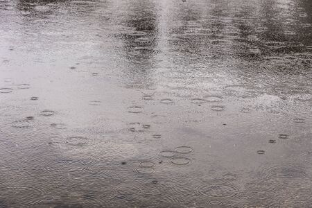 Raindrops falling on Summit Lake, Colorado.の写真素材