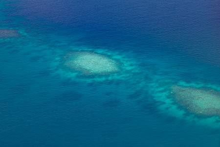 Islands aerial view. Aerial photo of beautiful Maldives paradise tropical beach. Coral reef, blue...