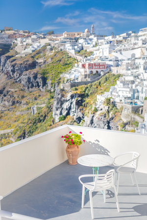 Beautiful Architecture building Exterior with Santorini and Greece style - Vintage light filter. Tranquil and romantic atmosphere at open air terrace restaurant in Beautiful Oiaの写真素材