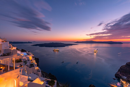 Beautiful sunset at Oia village on Santorini island, Greeceの写真素材