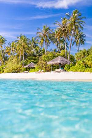 Summer vacation beach blurred background, view from blue sea. Peaceful nature concept, dream scene. Blur landscape beach, exotic holiday and travel destination conceptの写真素材