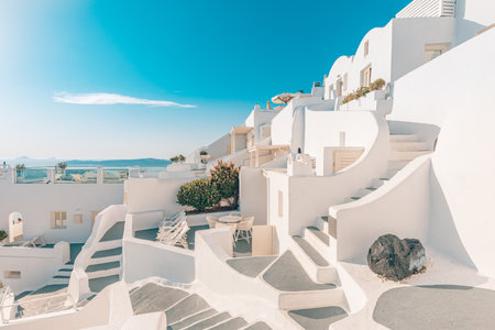 Amazing evening view of Fira, caldera, volcano of Santorini, Greece stairs romantic streets at...