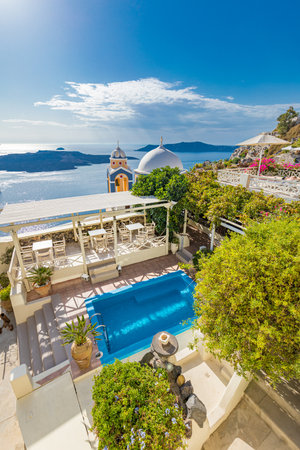 Luxury lifestyle, tourism destination Mediterranean. Summer travel vacation panoramic landscape of Santorini island. Famous travel destination fantastic private pool bathtub. 07.12のeditorial素材