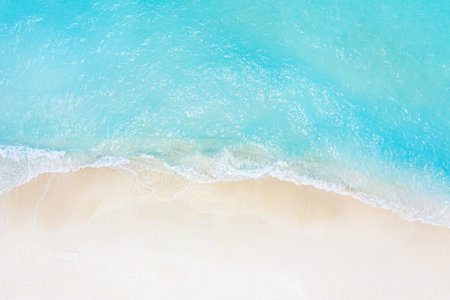 Relaxing aerial beach, summer vacation holiday design. Waves surf amazing blue ocean lagoon, sea...