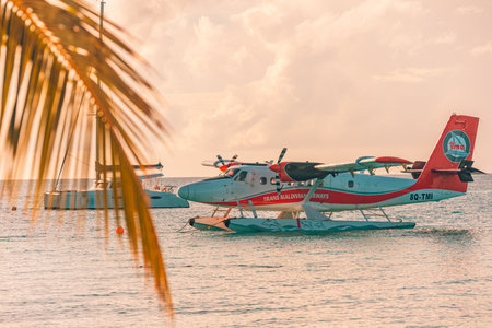 Sea plane at tropical beach resort. Luxury summer travel destination with seaplane in Maldives islands. Exotic vacation or holiday transportation, Maldives sea Ari Atoll, 18.12.21のeditorial素材