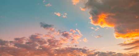 Wide angle view of sunset sunrise sky. Colorful sunset twilight sky, bright sun. Nature sky backgrounds. Idyllic relax tranquil freedom looking up positive energy happiness inspireの写真素材