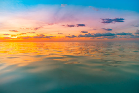 Sea sand sky concept, sunset colors clouds, horizon, horizontal seascape. Inspirational nature landscape, beautiful colors, wonderful tropical beach. Beach sunset, summer vacationの写真素材