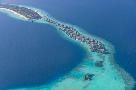 Maldives paradise. Tropical aerial landscape, seascape water villas resort island, amazing sea and lagoon beach, tropical nature. Exotic tourism destination banner, summer vacationの写真素材