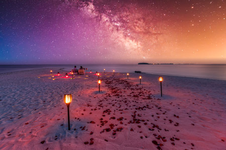 Amazing romantic dinner on beach candles flowers under sunset sky. Romance love, luxury destination dinning, exotic table setup sea view. Honeymoon celebration anniversary designの写真素材