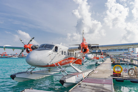 waterdrome Seaplane Terminal. seaplane is preparing to take off to islands at Male Water Airport, luxury travel tourism destination. Sea air transportation. Male, Maldives - 01.02.のeditorial素材