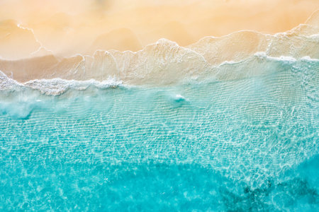 Beautiful aerial beach landscape, summer vacation holiday. Waves surf amazing blue ocean lagoon, sea...