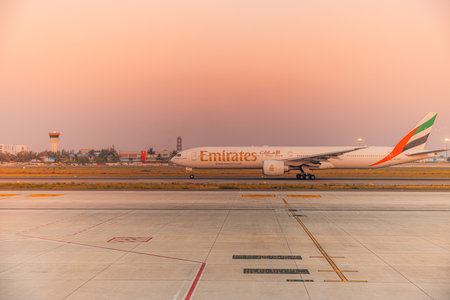Emirates Boeing 777-300ER taxiing on runway at Dubai International Airport. Emirates is the largest airline in the world. 04.08.22のeditorial素材