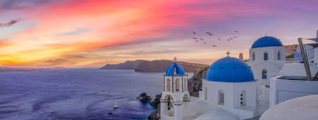 Europe summer destination. Traveling sunset scenic famous landscape of Santorini island, Oia, Greece. Caldera view, colorful clouds, dream cityscape. Vacation panorama, amazingの写真素材