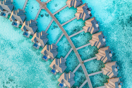 Beautiful Maldives paradise. Tropical aerial travel landscape seascape wooden bridge water villas amazing sea sand beach island nature. Exotic tourism destination summer vacationの写真素材