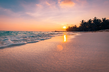 Fantastic closeup calm sea water waves orange sunrise sunset sunlight. Tropical island beach landscape exotic shore coast. Summer vacation holiday amazing nature. Relax paradiseの写真素材
