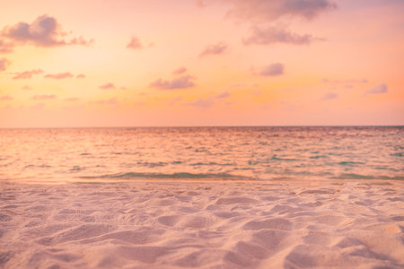 Closeup beach coast sand texture warm gold orange sunset light. Fantasy landscape sea bay. Tranquil relax bright horizon, colors sky. Peaceful nature seascape. Summer Mediterraneanの写真素材