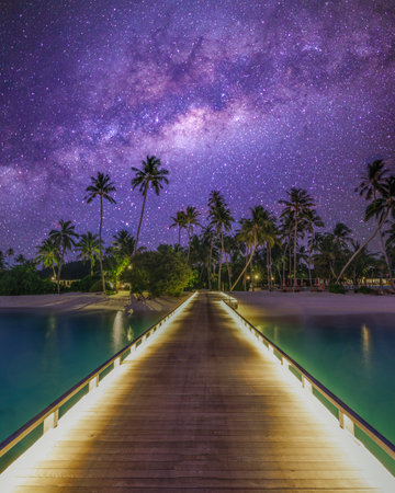 Romantic sunset Maldives pier breathtaking milky way sky, tropical ocean view with dreamy colors perfect summer vacation escape stargazing honeymoon travel relax paradise adventureの写真素材