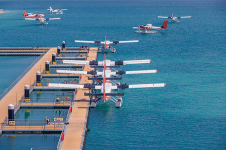 Amazing Maldives seaplanes floating dock aerial view, tropical travel tourism transportation...