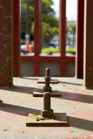 Detail in perspective of a line of three structural bolts.の写真素材