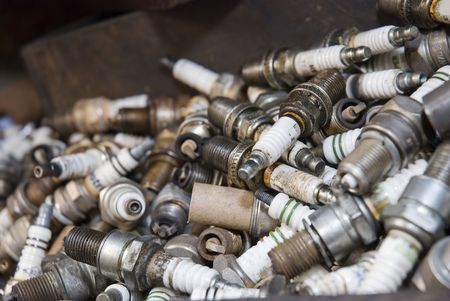 Details shot of a pile of old spark plugs.の写真素材
