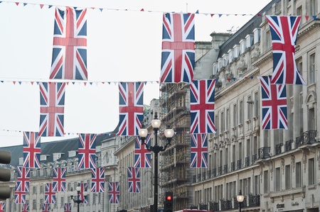 LONDON - APRIL 24: Central London hangs up buntings for Prince William and Catherine Middleton's royal wedding celebration to take place April 29 at Westminster Abbey. April 24, 2011 in London, England.のeditorial素材