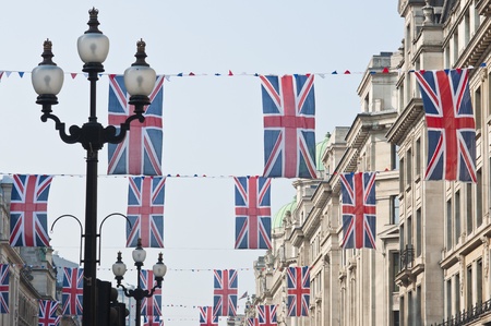 LONDON - APRIL 24: Central London hangs up buntings for Prince William and Catherine Middleton's royal wedding celebration to take place April 29 at Westminster Abbey. April 24, 2011 in London, England.のeditorial素材