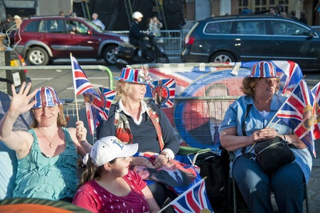 LONDON - APRIL 27: Royal family fans camp to secure a good spot at Westminster Abbey for Prince William and Catherine Middleton's royal wedding celebration to take place April 29. April 27, 2011 in London, England.のeditorial素材