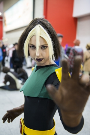LONDON, UK - OCTOBER 27: Cosplayer impersonating super heroine Rogue poses for photographers at the...