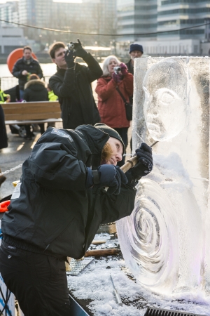 LONDON, UK - JANUARY 13: Artists compete in the freestyle category at the London Ice Sculpture Festival, in Canary Wharf. January 13, 2013 in London.のeditorial素材