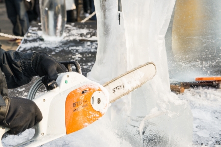 LONDON, UK - JANUARY 13: Artists compete in the freestyle category at the London Ice Sculpture Festival, in Canary Wharf. January 13, 2013 in London.のeditorial素材