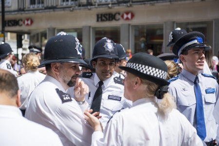 LONDON, UK - JUNE 29: Police constables waiting for the London Gay Pride parade to start in Baker Street. June 29, 2013 in London.のeditorial素材