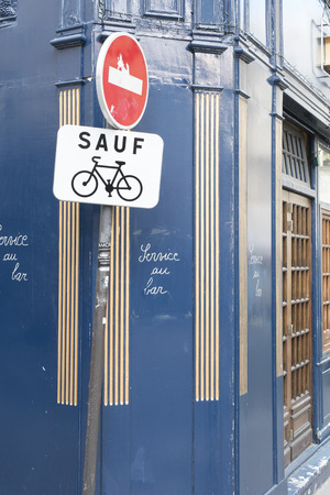 Paris street corner with bicycle sign.のeditorial素材