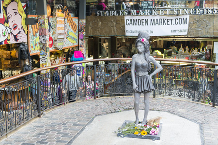 LONDON, UK - SEPTEMBER 17: Bronze statue of late singer Amy Winehouse in Camden Town. It was unveiled on what would have been her 31st birthday, 3 years after her death. September 17, 2014 in London.のeditorial素材