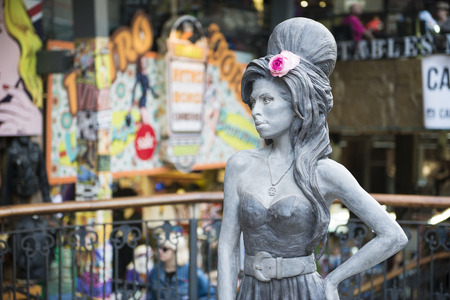 LONDON, UK - SEPTEMBER 17: Bronze statue of late singer Amy Winehouse in Camden Town. It was unveiled on what would have been her 31st birthday, 3 years after her death. September 17, 2014 in London.のeditorial素材