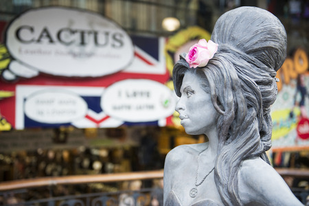 LONDON, UK - SEPTEMBER 17: Bronze statue of late singer Amy Winehouse in Camden Town. It was unveiled on what would have been her 31st birthday, 3 years after her death. September 17, 2014 in London.のeditorial素材
