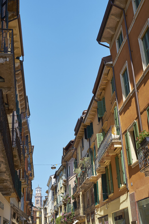 VERONA, ITALY - JULY 11: Via Mazzini with Lamberti Tower in the far background. July 11, 2015 in Verona. Via Mazzini is one of the main commercial streets in Verona.のeditorial素材