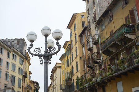 VERONA, ITALY - JULY 13: Low angle shot of lamp post in Piazza delle Erbe. July 13, 2015 in Verona.のeditorial素材