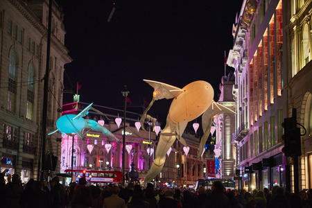 LONDON, UK - JANUARY 14: Les Luminoles installation by art group Port par le vent. The fish-like illuminated kites are part of the Lumiere London. January 14, 2016 in London.のeditorial素材