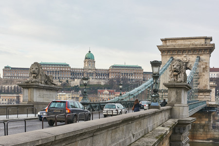 BUDAPEST, HUNGARY - FEBRUARY 02: Traffic over Szechenyi Chain Bridge with Buda Castle in the background. February 02, 2016 in Budapest.のeditorial素材