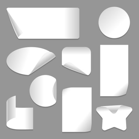 Set of vector white paper stickers of different shapes with curled corners isolated on white background. Round, ribbons, square, rectangular shapesのイラスト素材