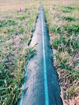 pipe in the grassの写真素材