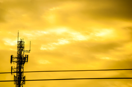 silhouette of electric post on eveningの写真素材